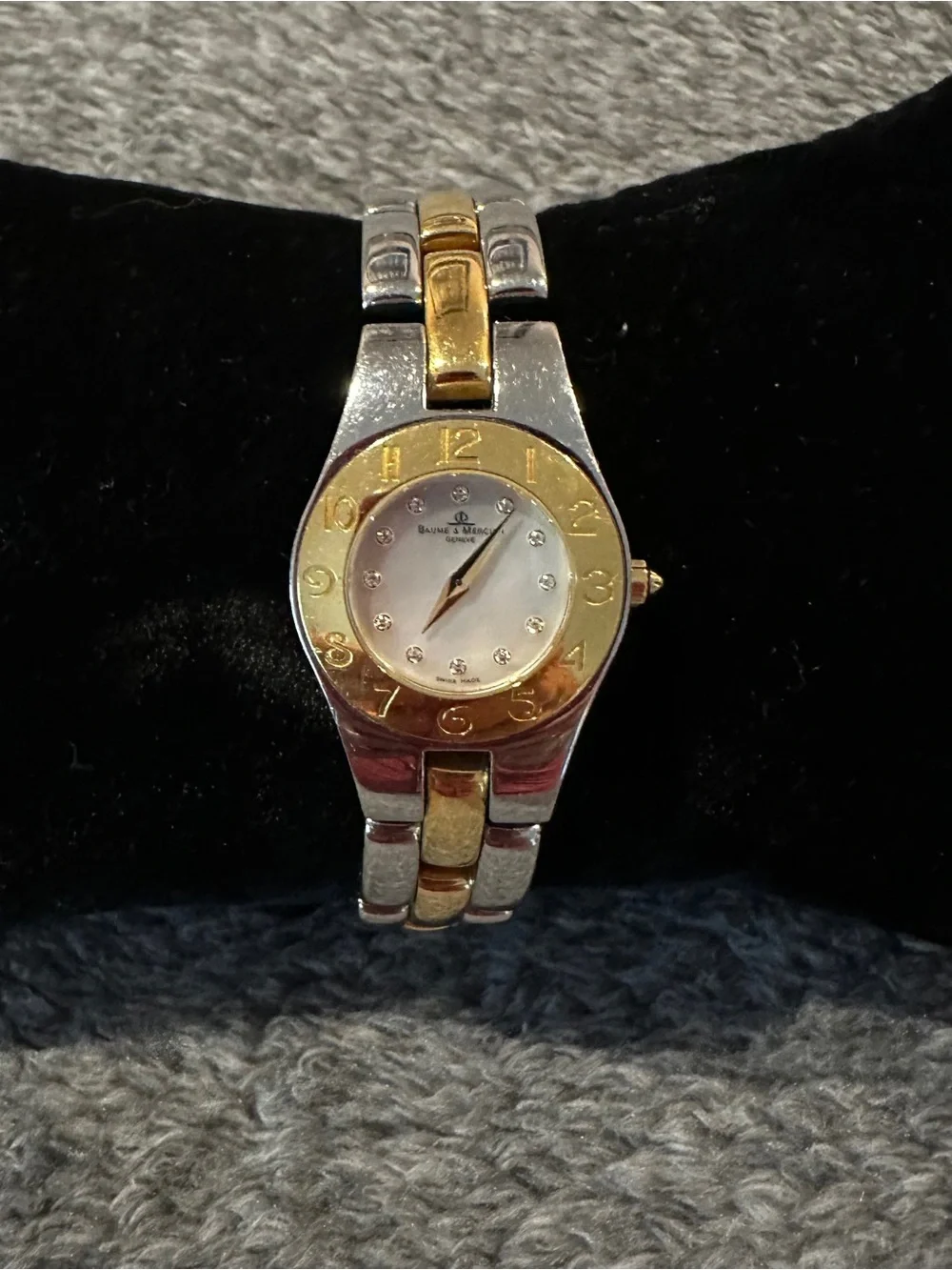 Baume & Mercier Linea 24mm two-toned 65304 watch w/ MOP face & diamond indices.